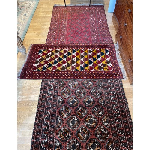 214 - An early 20th century Persian shiraz rug, hand woven kilim cotton having deep border with aztec patt... 