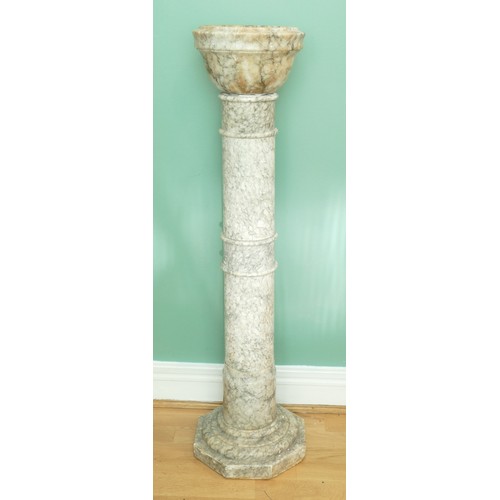 219 - A marble jardinière with matching circular pedestal column on rectangular plinth base.
H104, D25cm.