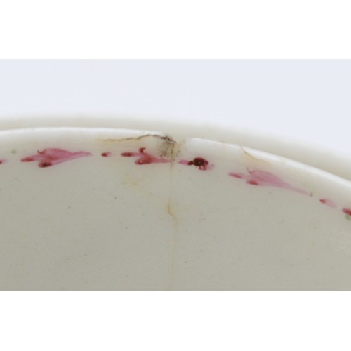 325 - A 19th century Newhall tea bowl & saucer, having floral garland and sprig decoration. (2)