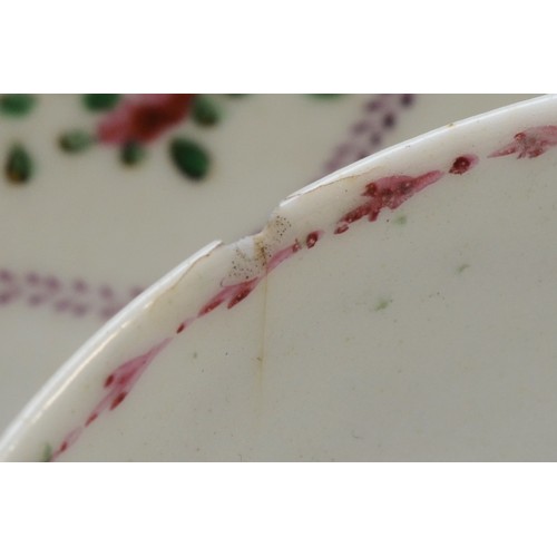 325 - A 19th century Newhall tea bowl & saucer, having floral garland and sprig decoration. (2)