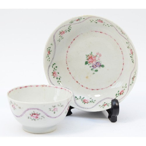 325 - A 19th century Newhall tea bowl & saucer, having floral garland and sprig decoration. (2)