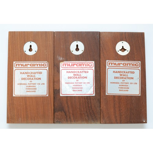 326 - Three Hornsea Muramic handcrafted wall plaques. 'Tudor Queen', 'Admiral' and 'Spaceman', designed by... 