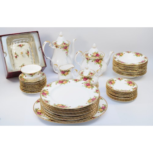 329 - An extensive Royal Albert Old Country Roses dinner service comprising of teapot, coffee pot, lidded ... 