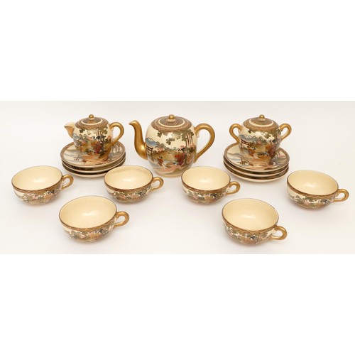 338 - A Japanese Meiji Satsuma tea service, by  Maruni under the Shimazu family crest, comprising teapot, ... 