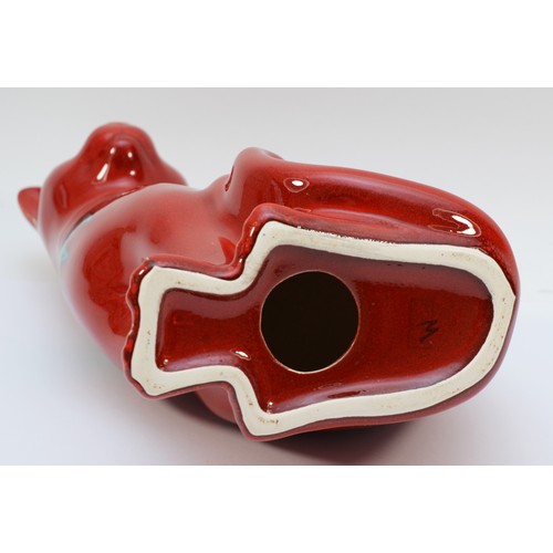 333 - A Poole Pottery red flambe Delphis cat figure, 29cm high, (boxed)