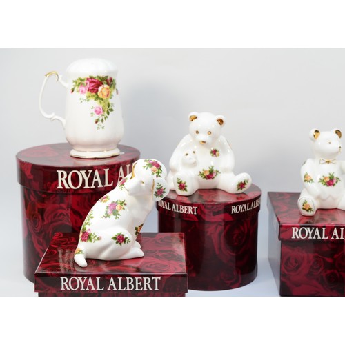 331 - A group of Royal Albert 'Old Country Roses' porcelain models, comprising a seated dog, sleeping kitt... 