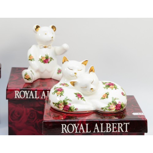 331 - A group of Royal Albert 'Old Country Roses' porcelain models, comprising a seated dog, sleeping kitt... 