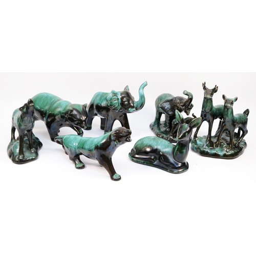 335 - A collection of large Canadian Blue Mountain Pottery animal figures, black with green drip glaze col... 