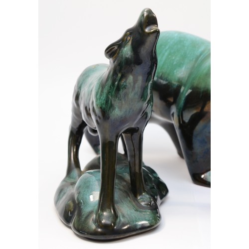 335 - A collection of large Canadian Blue Mountain Pottery animal figures, black with green drip glaze col... 