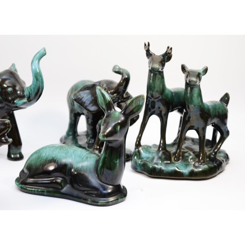 335 - A collection of large Canadian Blue Mountain Pottery animal figures, black with green drip glaze col... 