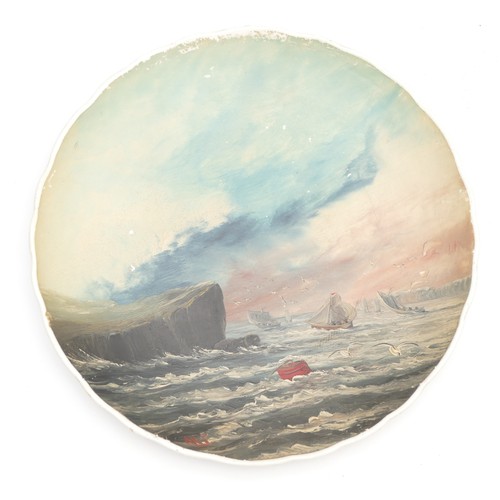 345 - An early 20th century painted ceramic plate, depicting sailing boats on stormy seas, indistinctly si... 