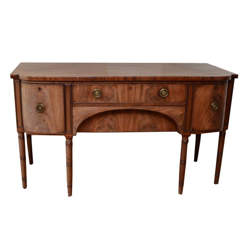 355 - A late Victorian Hepplewhite style mahogany sideboard, the two bow fronted cupboards flanking two re... 