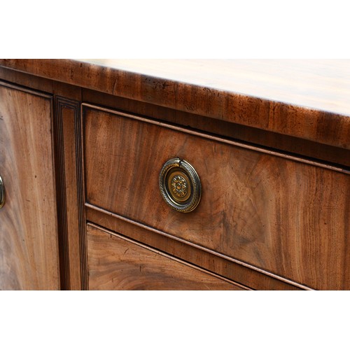 355 - A late Victorian Hepplewhite style mahogany sideboard, the two bow fronted cupboards flanking two re... 