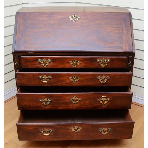 358 - A Georgian mahogany bureau, moulded rectangular fall front with rounded upper corners opening to fit... 