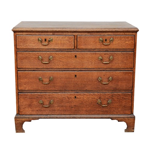 360 - A late 18th century Georgian oak chest, the moulded edged top over two short and three long cockbead... 