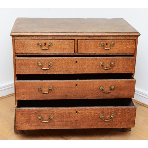 360 - A late 18th century Georgian oak chest, the moulded edged top over two short and three long cockbead... 