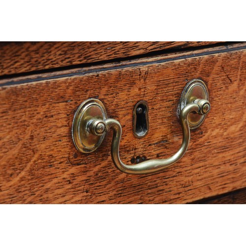 360 - A late 18th century Georgian oak chest, the moulded edged top over two short and three long cockbead... 