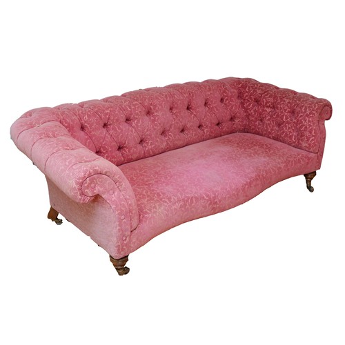 367 - An Edwardian Chesterfield sofa, upholstered in a burgundy Fleur De Lis pattern fabric, buttoned-down... 