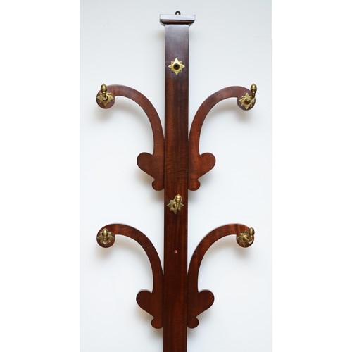 369 - A Victorian mahogany hall coat stand, the central upright issuing three tiers of scroll shaped branc... 