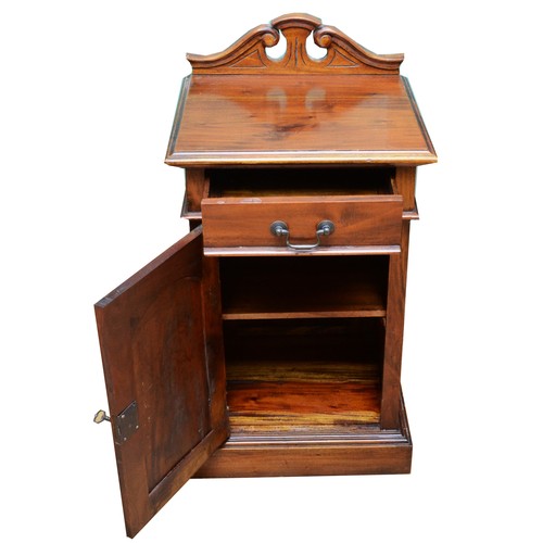 371 - A Victorian mahogany pot cupboard, single drawer over panelled door opening to reveal a single shelf... 