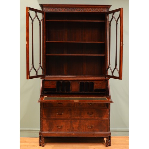 372 - A George III mahogany bureau bookcase, moulded dentil carved cornice over two astragal glazed doors,... 