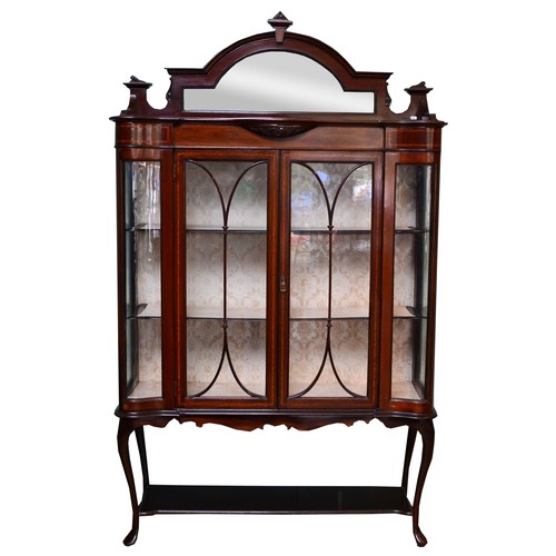 373 - Edwardian inlaid mahogany display cabinet, the central arched mirror plate within a carved scroll co... 