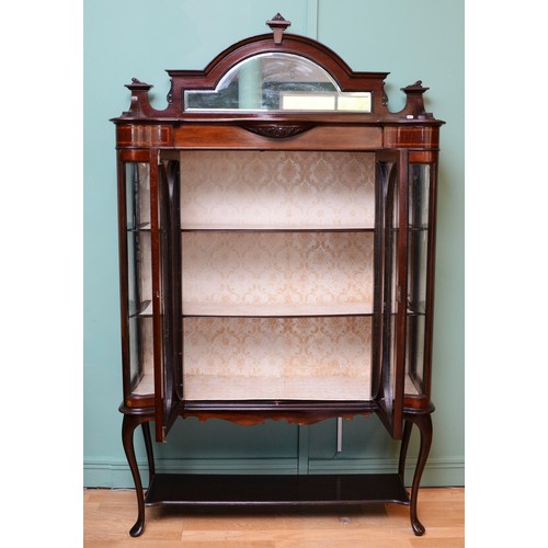 373 - Edwardian inlaid mahogany display cabinet, the central arched mirror plate within a carved scroll co... 