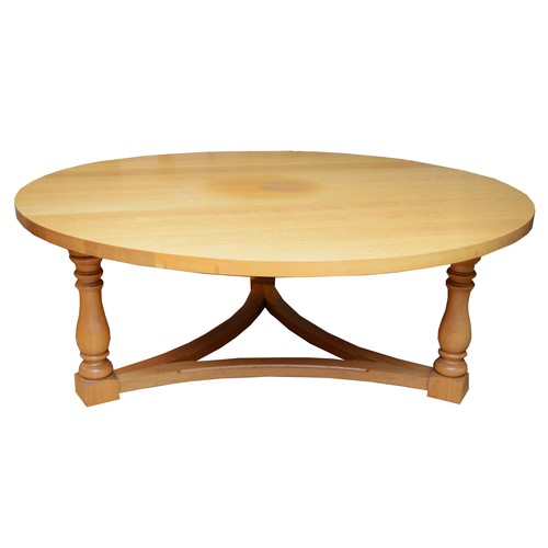 376 - A substantial and impressive modern dining table, light coloured solid oak construction, the rounded... 