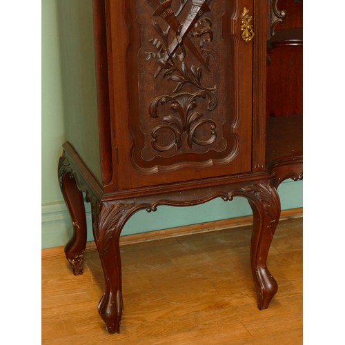 378 - A late Victorian carved mahogany mirror back display cabinet, the carved and pierced decorated arche... 