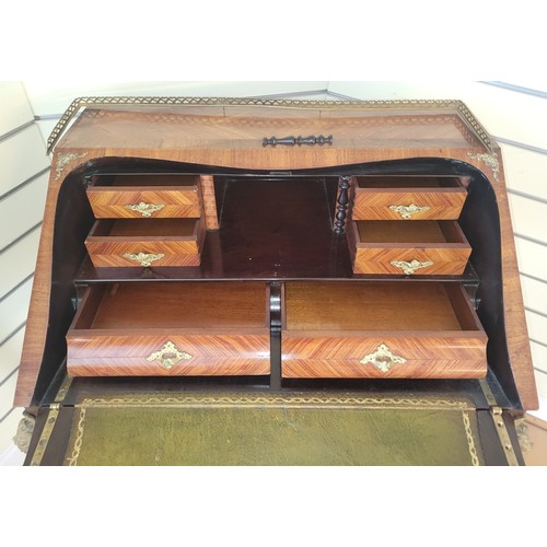 380 - A French mahogany and walnut bureau de dame, in the Louis XV style, ormolu mounted, the cartouche sh... 