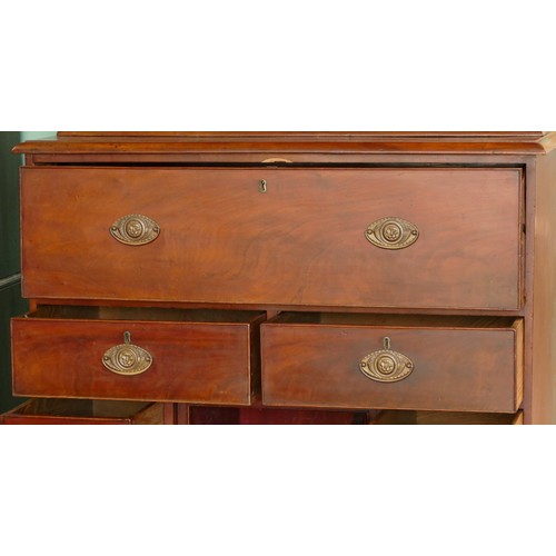 381 - A late 19th century mahogany secretaire bookcase, the top with a stepped pediment over two glazed do... 