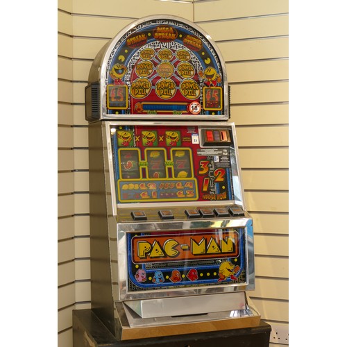 387 - Pac Man, a category C gaming machine, recently retired from service, 67 × 60 × 185 cm.
Lights up but... 