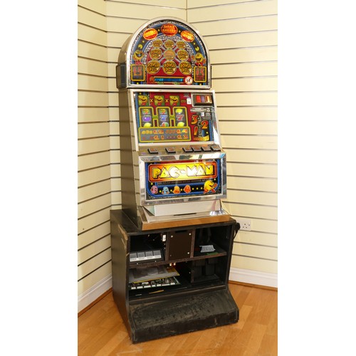 387 - Pac Man, a category C gaming machine, recently retired from service, 67 × 60 × 185 cm.
Lights up but... 