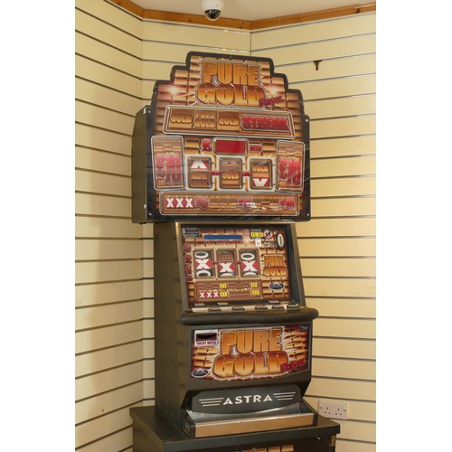 389 - Pure Gold, a category C gaming machine, recently retired from service, 75 × 62 × 220 cm.
Does not li... 