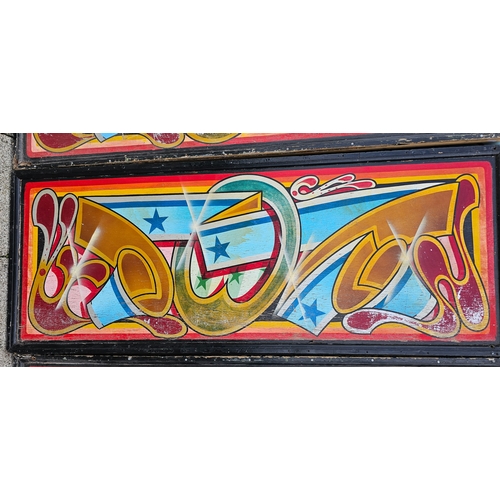 384 - A set of four original hand painted fair ground stall panels, 66 x 170cm.