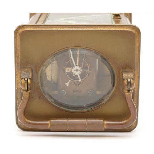 242 - A 20th century gilt brass 8 day carriage, the enamelled white dial with Roman numerals, movement str... 