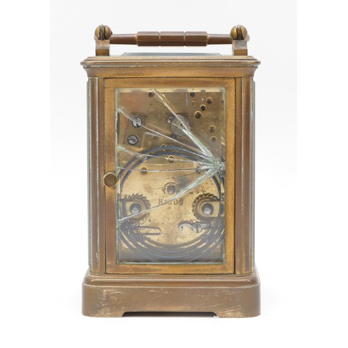 242 - A 20th century gilt brass 8 day carriage, the enamelled white dial with Roman numerals, movement str... 