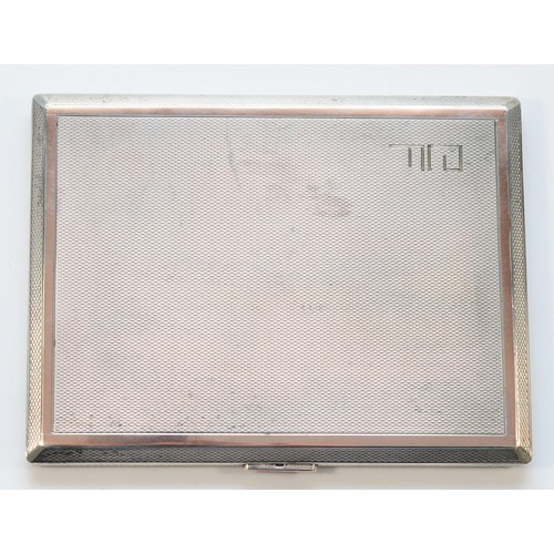 3 - A silver engine turned cigarette case, London 1939, 11 x 8.5cm, 178gm