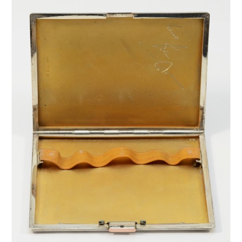 3 - A silver engine turned cigarette case, London 1939, 11 x 8.5cm, 178gm