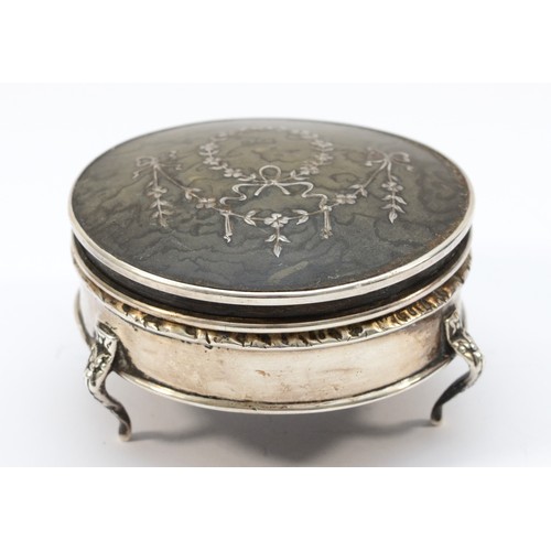 25 - A silver and tortoiseshell trinket box, Birmingham 1911, hinged cover, diameter 7cm