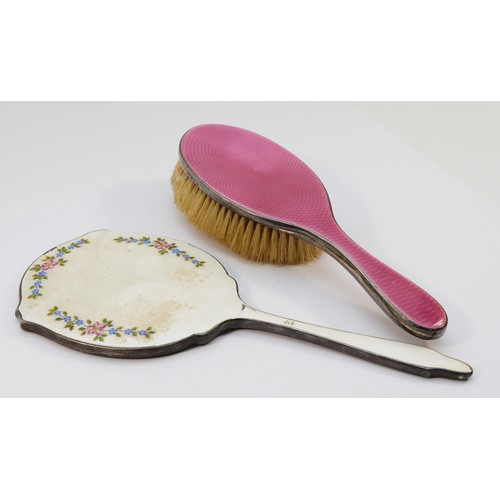 34 - A silver and white guilloche enamel hand mirror, Birmingham 1948 and a silver and pink guilloche ena... 