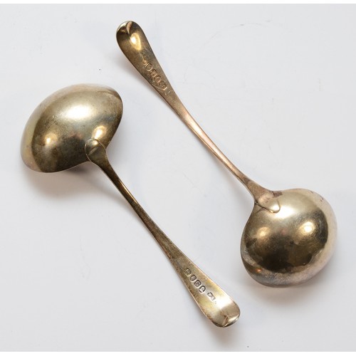 38 - Two silver George III gravy ladles, London 1794 and 1798, 80gm