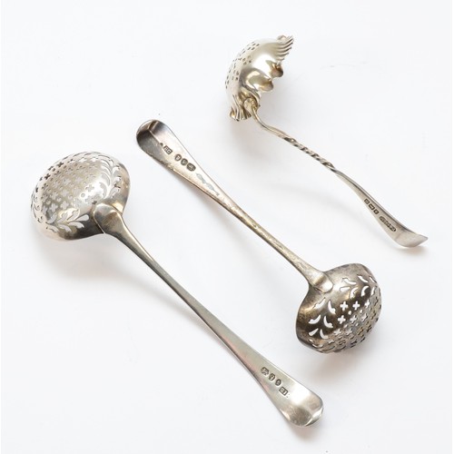 39 - A George III silver feather edge sifter spoon, London 1791, another 1802 and a third, Birmingham 191... 