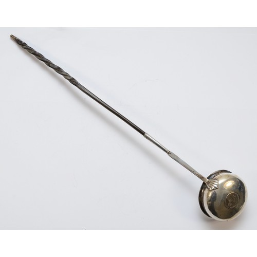 41 - A George III silver and whalebone ladle, unmarked, the bowl inset with a 1757 silver coin, contempor... 