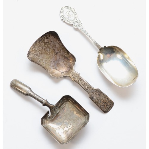 44 - A Victorian silver shovel caddy spoon, Birmingham 1839, floral engraved handle, another Birmingham 1... 