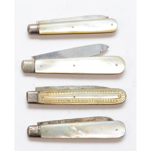 55 - Four Victorian and later mother of pearl and silver fruit knives.