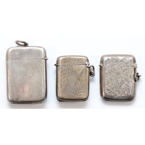 61 - Three silver vesta cases, London 1886, Birmingham 1912, and 1919, 71gm