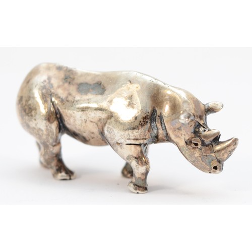 67 - A solid silver Rhinoceros statue, by Clive & Clarissa Cooke,  London 1988, 41mm, 35gm.