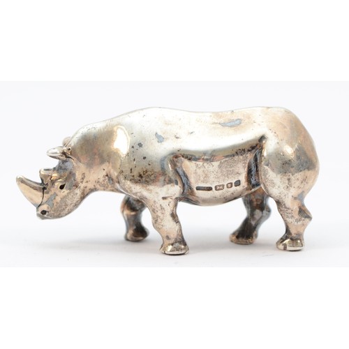 67 - A solid silver Rhinoceros statue, by Clive & Clarissa Cooke,  London 1988, 41mm, 35gm.