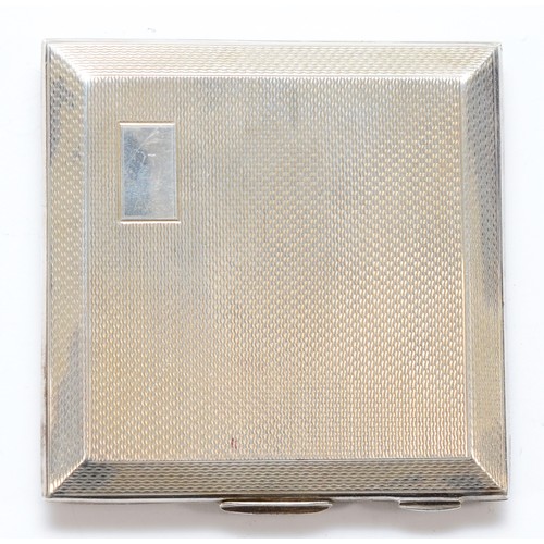 75 - A square silver powder compact, Birmingham 1946, opening to reveal a mirror and powder, 7 x 7cm, 89g... 